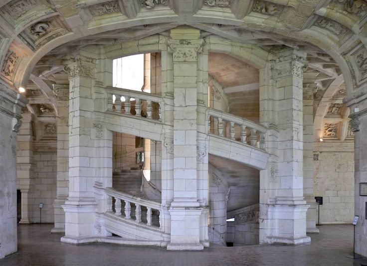 the inside of an old building with stone stairs