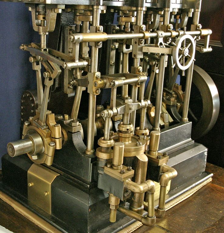 an old machine with lots of pipes and valves