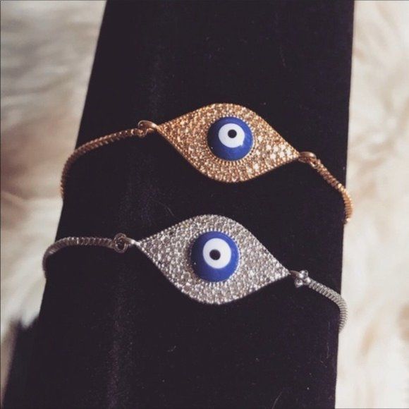 Brand New Evil Eye Bracelet, Evil Eye Jewelry Gold Bracelet Or Silver Bracelet Available Fashion Jewelry High Quality Plated Hypoallergenic Nickel Free Adjustable Length Chain 8” Cubic Zirconia Stones With Blue Eye Design Trendy Jewelry, Dainty Gold Jewelry, Evil Eye Bracelet, Blogger Favorite, Evil Eye Chain Bracelet, Gold Chain Bracelet, Silver Bracelet, Eye Jewelry, Gift Evil Eye Bracelet Adjustable Bracelet Packaged With Care Will Not Tarnish With Proper Care Trendy Silver Beaded Bracelet With Adjustable Chain, Trendy Nickel-free Silver Bracelet, Adjustable Silver Alloy Crystal Bracelet, Adjustable Silver Crystal Alloy Bracelet, Silver Chain Alloy Bracelet Gift, Adjustable Silver Chain Bracelet In Alloy, Trendy Silver Metal Beaded Bracelets, Resizable Silver Beaded Bracelets, Silver Alloy Charm Bracelet For Party