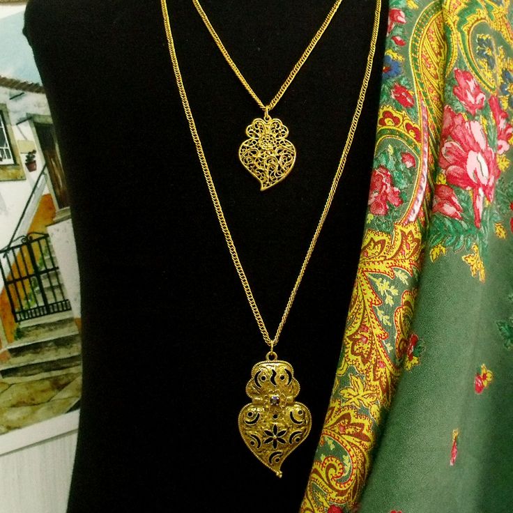 Portuguese folk Hearts of Viana filigree style rich gold tone strands jewelry necklace with rhinestone. Made by me in Portugal inspired in traditional jewelry used by women in Minho, region in the north of country.$42.50#madeinportugal#portuguesenecklace#portuguesefiligree#heartofviana#colarcoraçãodeviana#vianaheart#portuguesejewelry#portugalfolkart#helenaaleixo Gold Filigree, Traditional Jewelry, Jewelry Necklace, Made By Me, Artisan Jewelry, Long Necklace, Different Styles, Portugal, Gold Tones