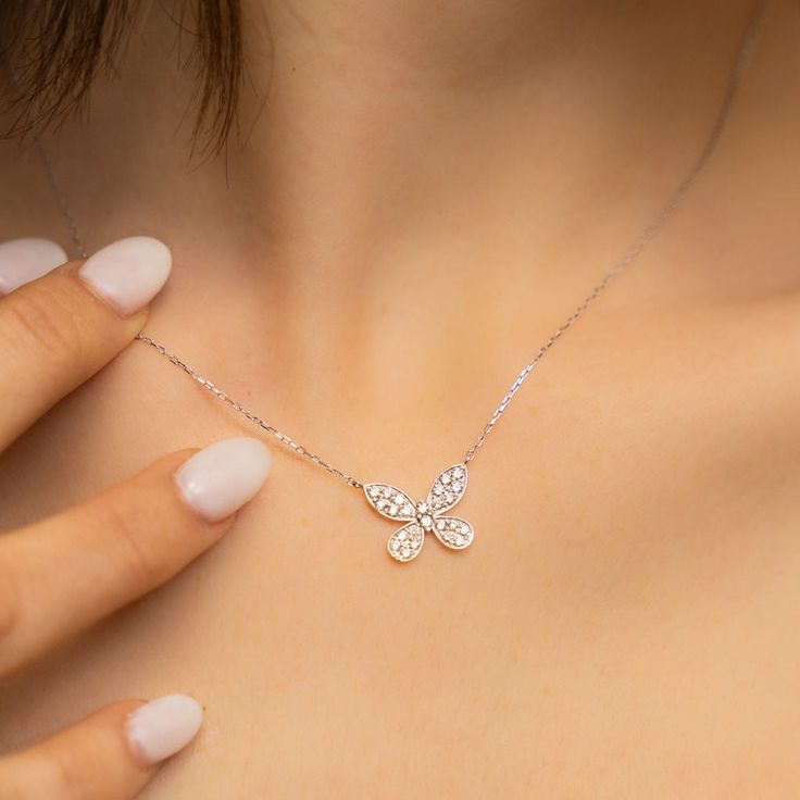 Get ready to make hearts flutter when you rock this stunning Mirabella Diamond Butterfly Necklace in 18K white or yellow gold! Pair it with anything from our Butterflies Collection for an all-over charming look. Natural Diamonds: 0.45ctw 18K White or Yellow Gold Length: 16 Inches Dainty Diamond Necklace With Butterfly Charm, Luxury White Gold Butterfly Pendant Necklace, Luxury White Gold Necklaces With Butterfly Charm, Luxury White Gold Necklace With Butterfly Charm, Fine Jewelry Cubic Zirconia Necklace With Butterfly Charm, Fine Jewelry Diamond Butterfly Necklace, Sterling Silver Necklace With Butterfly Charm, Luxury Butterfly Necklace With Diamond Accents, White Diamond Necklace With Butterfly Charm