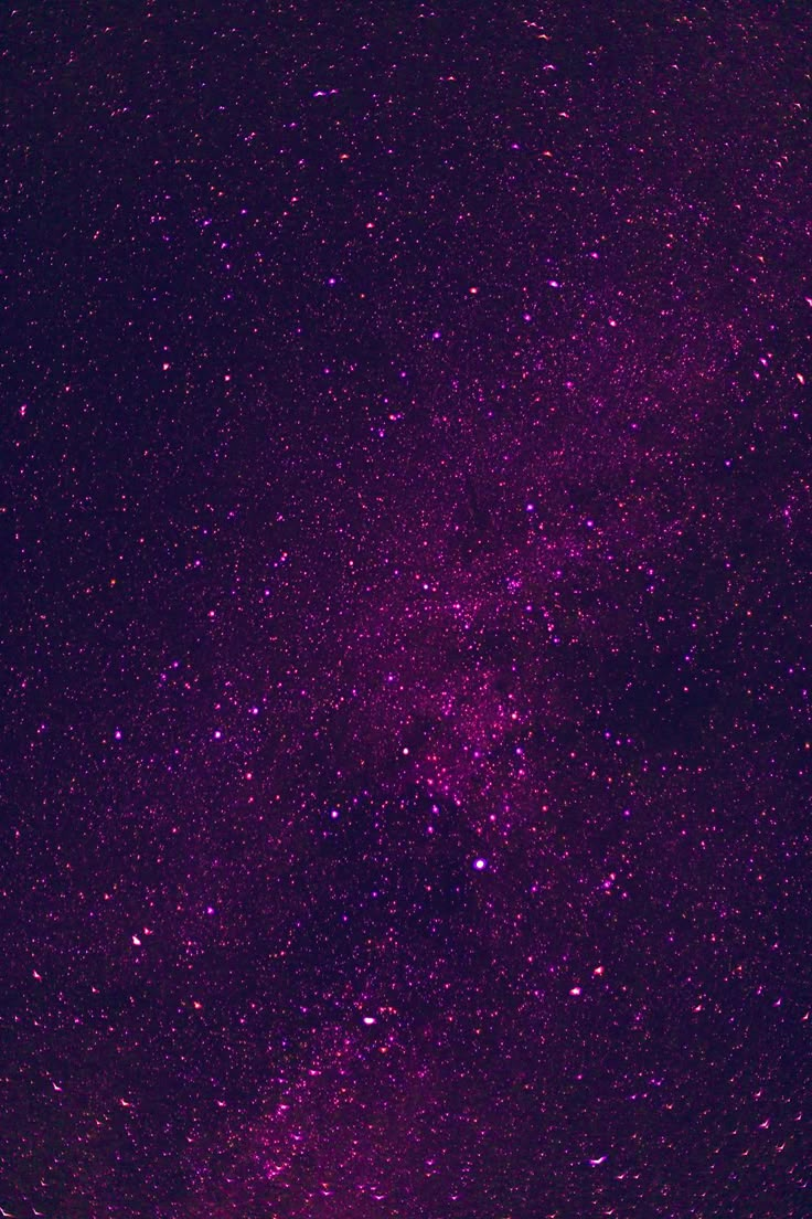 the night sky is filled with purple stars