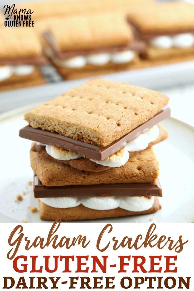 two graham crackers are stacked on top of each other with marshmallows