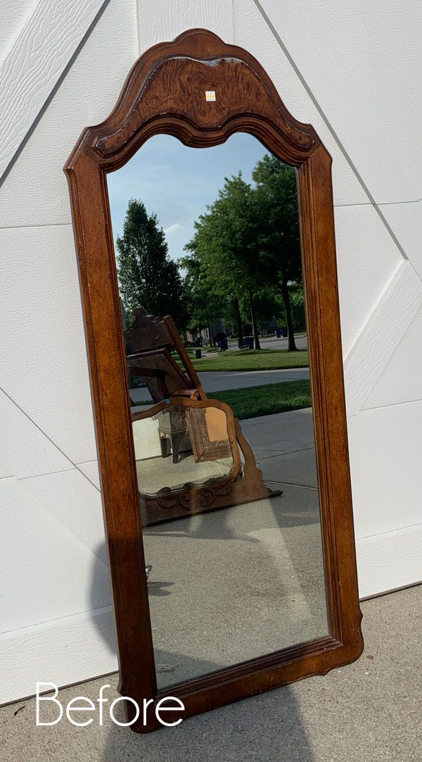 a mirror that is sitting on the ground