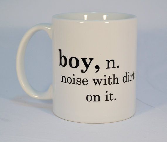 a white coffee mug with the words boy n, noise with dirt on it written in black