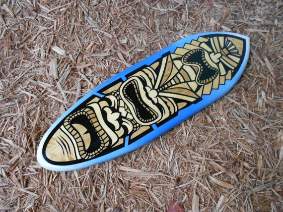 a surfboard is laying on the ground