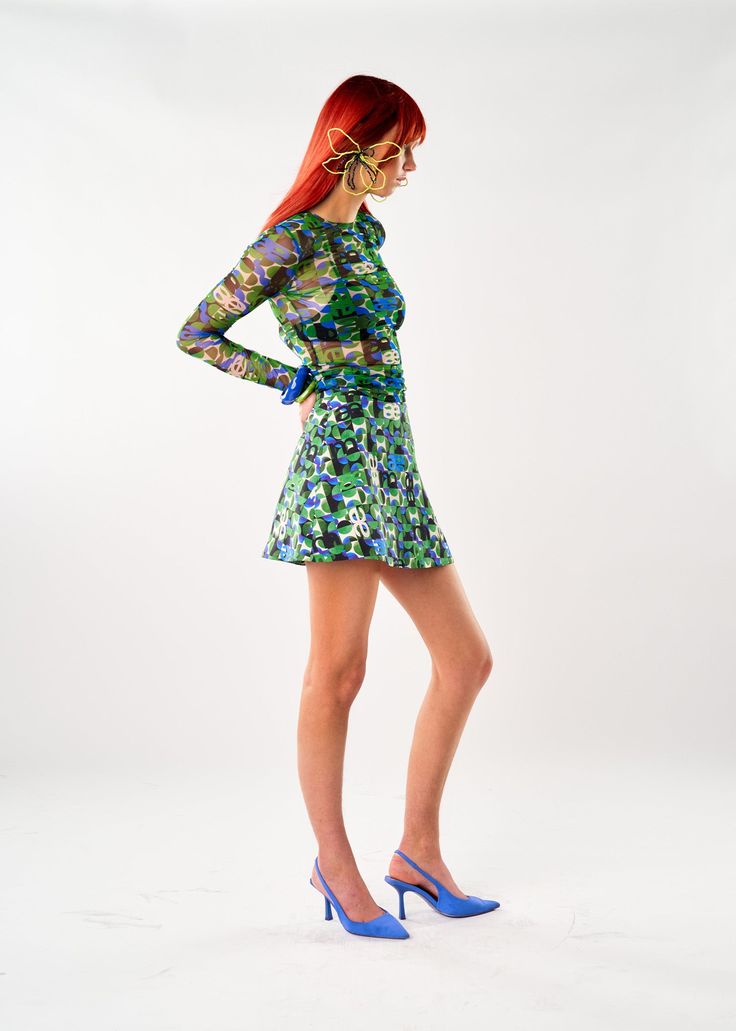 It wouldn't be a 60s homage without Twiggy! The only mini skirt you'll ever need, perfectly trapeze, high waist just the way we like them. Fitted Mini Hem Skort For Party, Green Mini Dress For Party, Fitted Skort For Cocktail Occasions, Fitted Skort For Spring Evening, Flirty Mini Hem Skirt For Party, Flirty Mini Hem Party Skirt, Spring Party Skirt With Mini Hem, Fitted Green Mini Skirt For Evening, Spring Mini Skirt Fitted