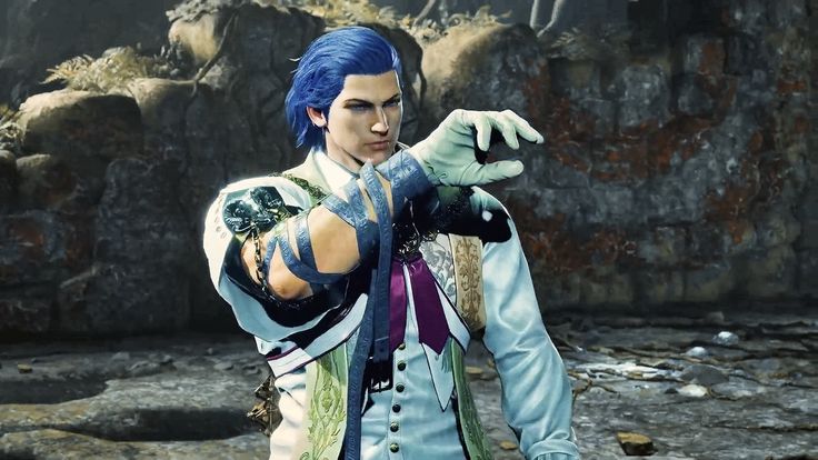 a man with blue hair pointing to something in his hand while standing on some rocks