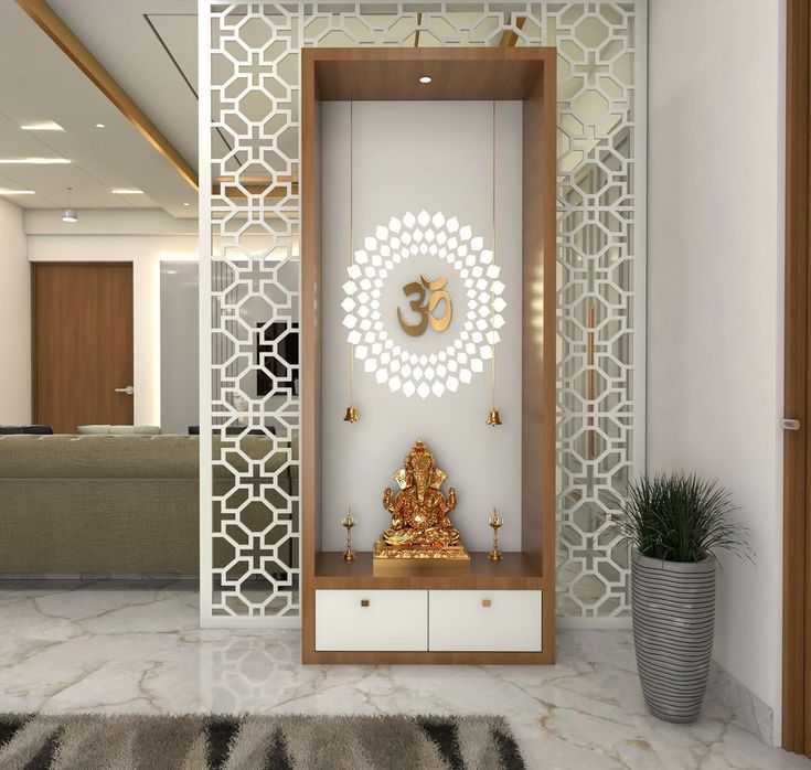 a white and gold room with a buddha statue in the center, surrounded by decorative wall panels