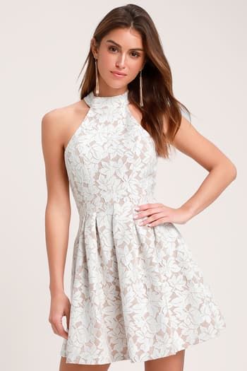 Trendy White Dresses for Women in the Latest Styles | Find a Cute Little White Dress for a Summer Party | Affordable All-White Dresses Feminine Fit And Flare Mini Dress For Prom, Feminine Fit And Flare Prom Mini Dress, Elegant Floral Fit And Flare Dress For Summer, Elegant Fit And Flare Floral Dress For Summer, Elegant Floral Fit And Flare Summer Dress, Elegant Summer Floral Fit And Flare Dress, Spring Evening Halter Neck Dress, Strapless Floral Dress For Garden Party, Elegant Sleeveless Mini Dress For Garden Party