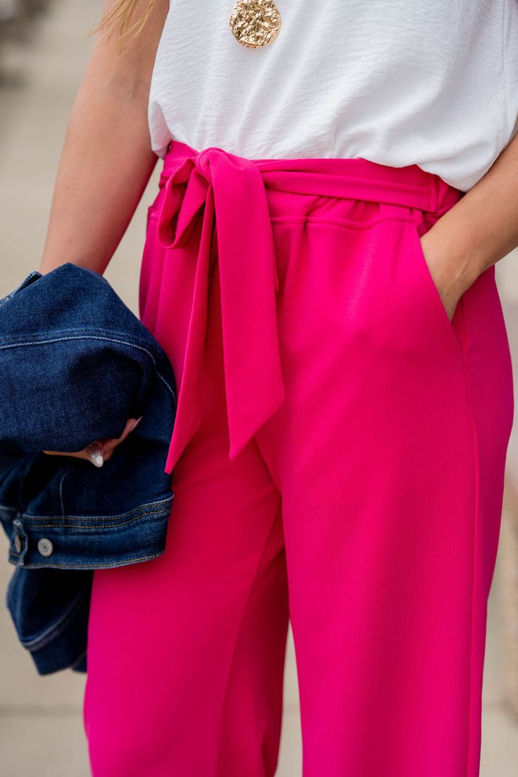 We are obsessed with these pants! Perfect for the office or the classroom or even date night out on the town! The dressier material, tie waist, pockets, and flare bottom detailing really set this apart from the rest! Pair these with a cute blouse tucked in for a more elevated look or even with a graphic tee and a denim jacket for a more casual outfit! Tie Waist Pants, Cute Blouses, Boutique Shop, Waist Pants, The Classroom, Casual Outfit, Date Night, Graphic Tee, Hot Pink