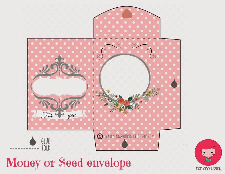 a pink box with white polka dots and flowers on the front, it is cut out to look like an envelope for money or seed envelope