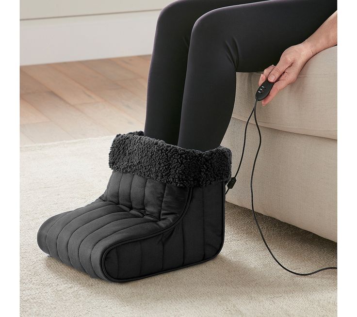 Treat your feet to cozy, soothing warmth with the Shavel Micro Flannel heated foot warmer. This innovative foot warmer features Micro Flannel fabric that combines the cozy comfort of cotton flannel with the convenience of being wrinkle-resistant and easy to care for. After a chilly day, slip into the ultra-soft sherpa fleece sock and let the electric heating pad gently warm your feet. From Shavel. Fleece Socks, Useful Items, Heating Pad, Electric Heating, Flannel Fabric, Comforters Cozy, Sherpa Fleece, Home Products, Cotton Flannel