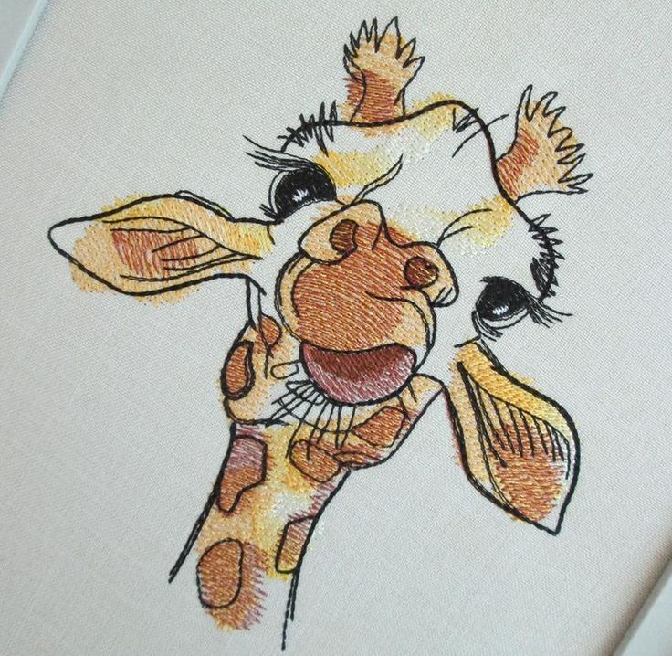 a cross stitch picture of a giraffe with its tongue out and eyes wide open