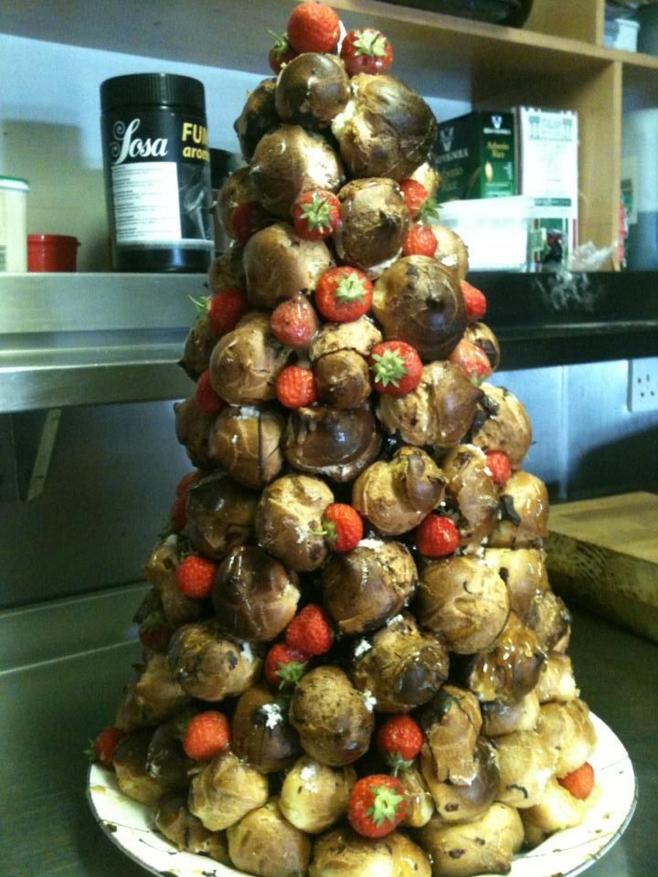 a christmas tree made out of chocolate covered strawberries