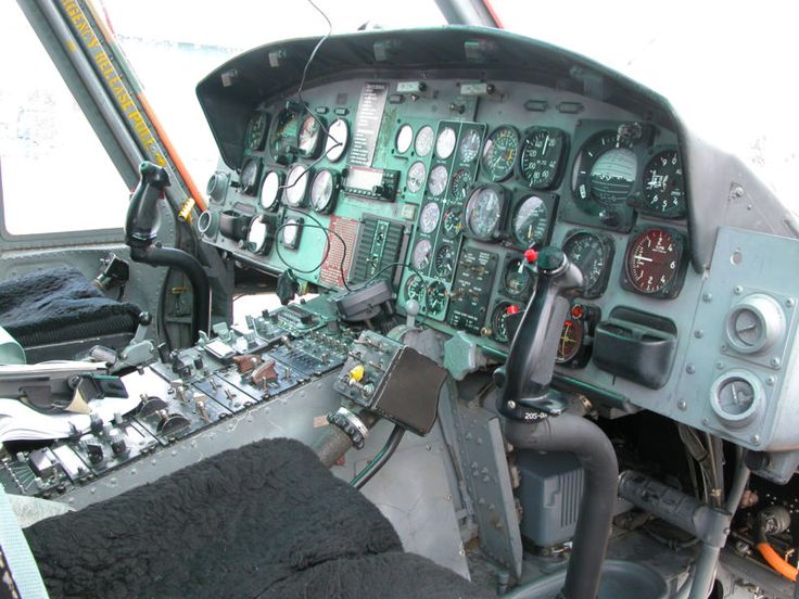 the cockpit of an airplane with multiple controls