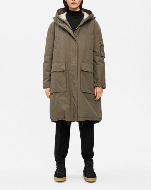 The fishtail parka is a timeless style icon, reaching further than its functional accomplishments. Our version is longer at the back with faux shearling lining at the hood, and with contrast quilting on the inside lining.<br><br> • Faux shearling hood Oversized Trench, Fishtail Parka, Belted Coat, Style Icon, Timeless Style, Military Jacket, Parka, Timeless Fashion, Quilting