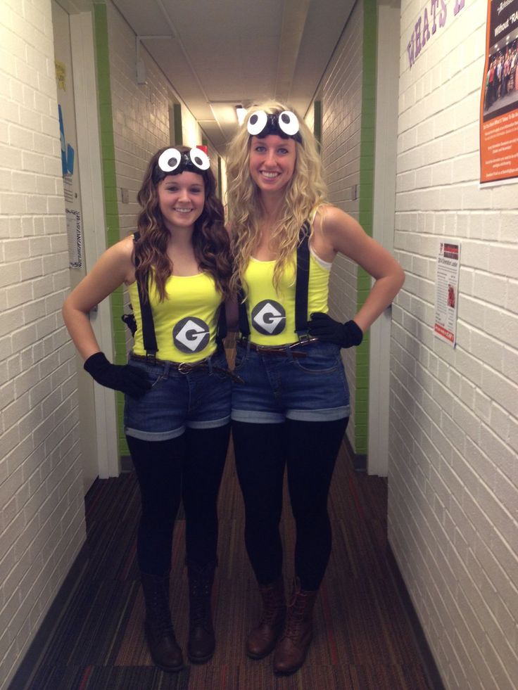 two young women dressed as minions from the movie despicaded standing in a hallway