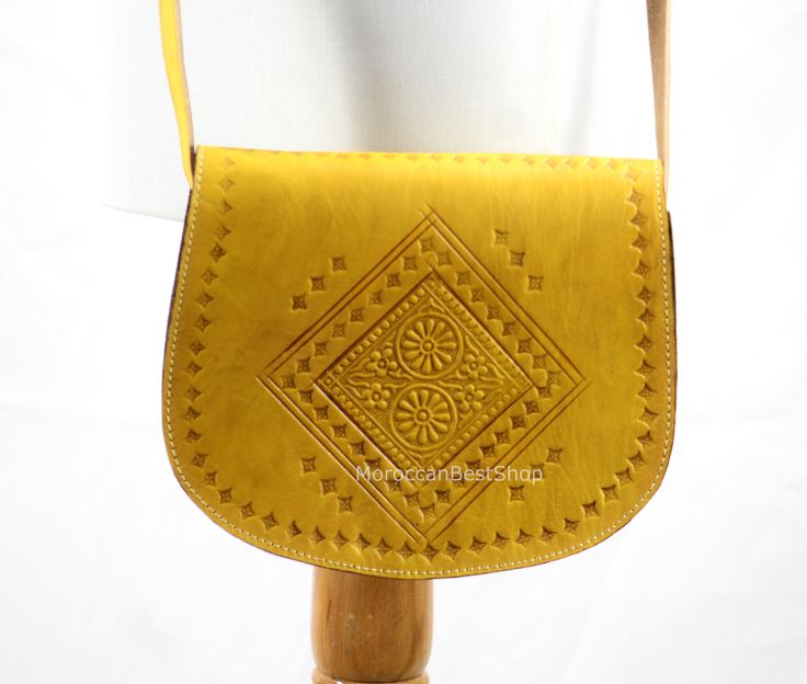 "This Leather shoulder bag is made from genuine goat leather , treated with traditional methods such as using a natural dyes and contains a good protection way by including a natural oils and a beeswax, Furthermore the leather was treated with no chemicals matters ,so it is definitely a premium Leather and an eco-friendly. FEATURES: - Comfortable and Suitable. - Zipper Pocket Inside. MEASUREMENTS: * Length : 32 cm / 12.5 \" * Width :   10 cm /  4 \" * Height:  32 cm / 12.5 \"" Traditional Satchel Saddle Bag For Daily Use, Traditional Crossbody Saddle Bag For Everyday Use, Traditional Yellow Shoulder Bag For Everyday Use, Traditional Saddle Shoulder Bag For Daily Use, Traditional Leather Saddle Bag, Traditional Yellow Bags For Everyday Use, Traditional Yellow Bag For Everyday Use, Traditional Saddle Bag With Adjustable Strap For Daily Use, Traditional Yellow Shoulder Bag For Daily Use