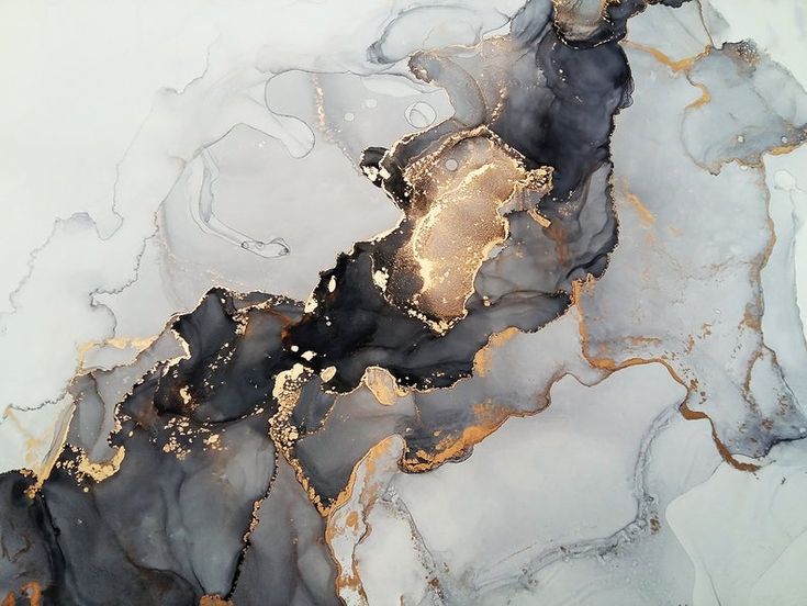 an abstract marble background with gold and black