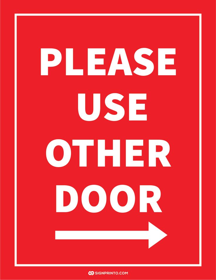 a red sign with the words please use other door and an arrow pointing to it