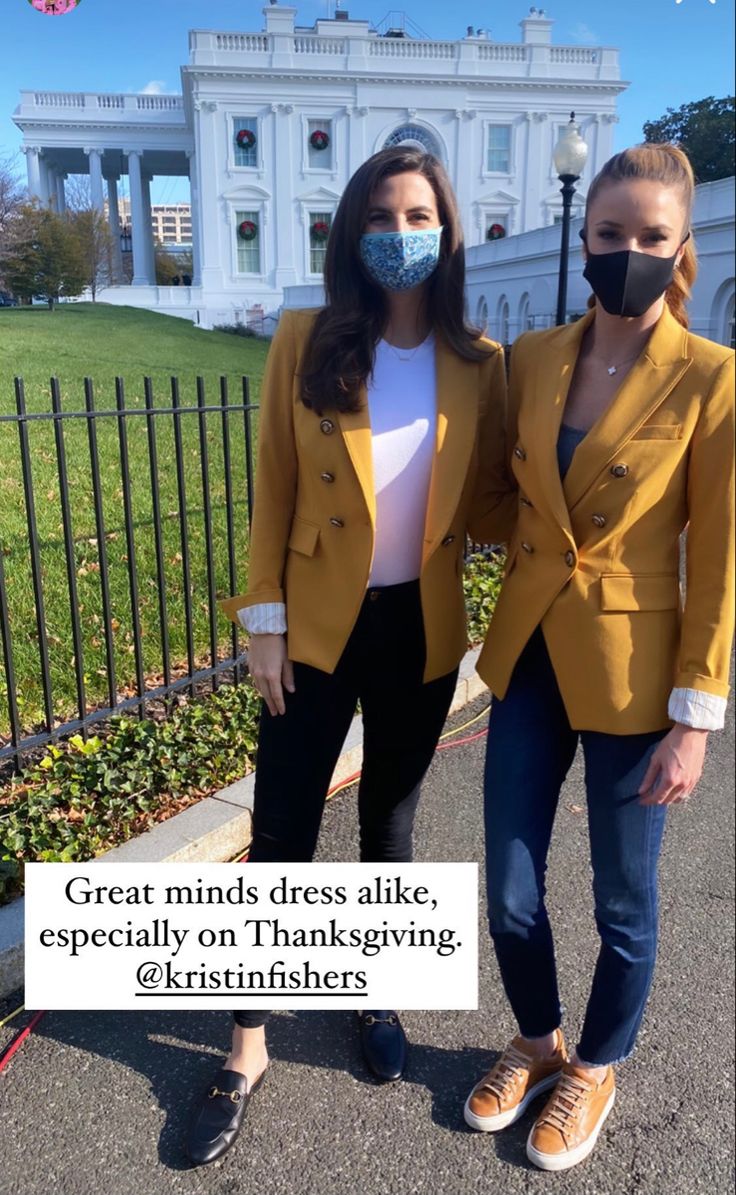 two women wearing face masks standing in front of the white house with text that reads, great minds dress like especially on thanksgiving