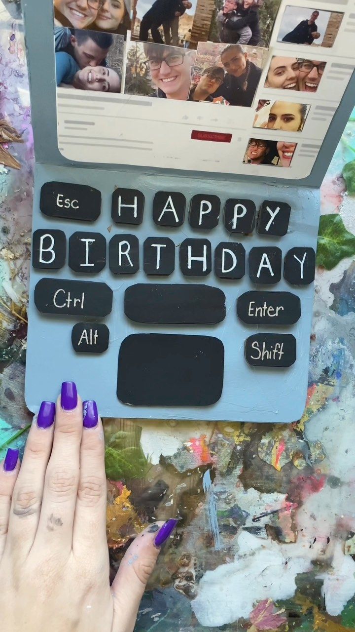 a woman's hand on top of a laptop computer keyboard with the words happy birthday written on it