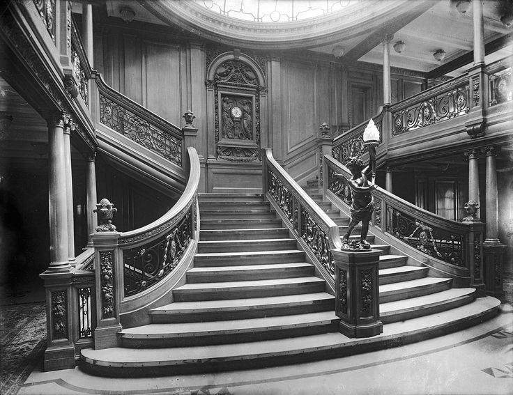 an old photo of a staircase in a building