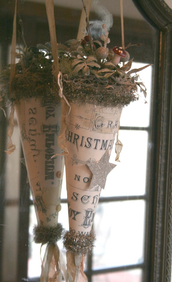 an old fashioned christmas decoration hanging from a window sill in front of a mirror