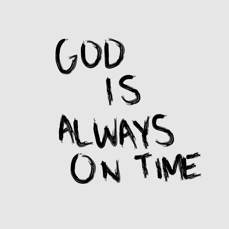 the words god is always on time are drawn in black ink against a white background