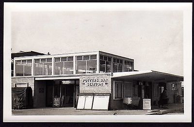 an old black and white photo of a building that has been converted into a medical office