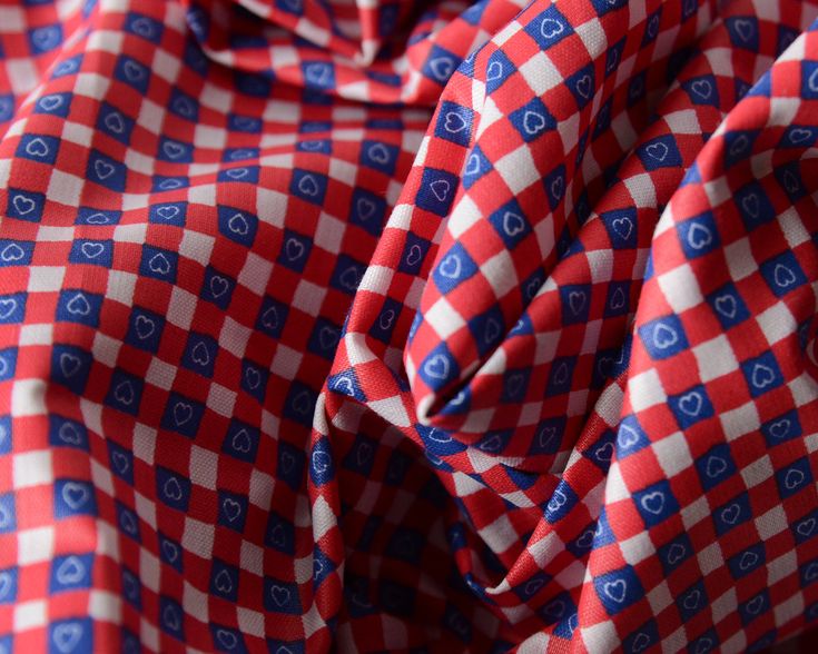 red and blue checkered fabric with hearts on it