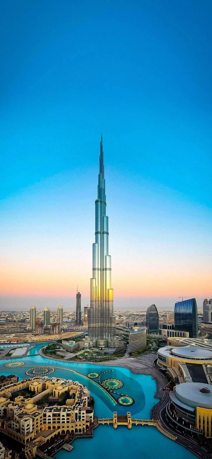 an aerial view of the burj tower in dubai