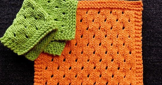 an orange and green knitted dish cloth