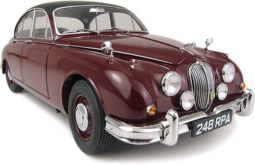 an old fashioned maroon car on a white background