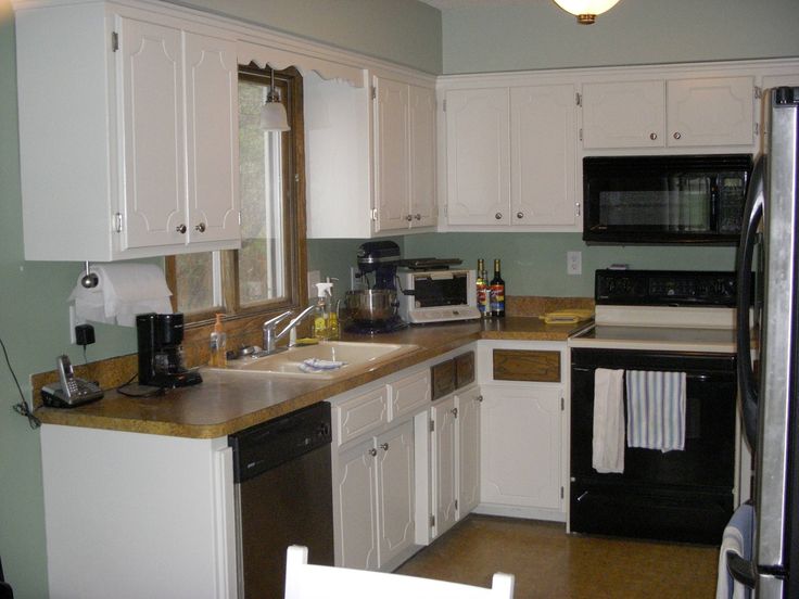 the kitchen is clean and ready for us to use it's new appliances in