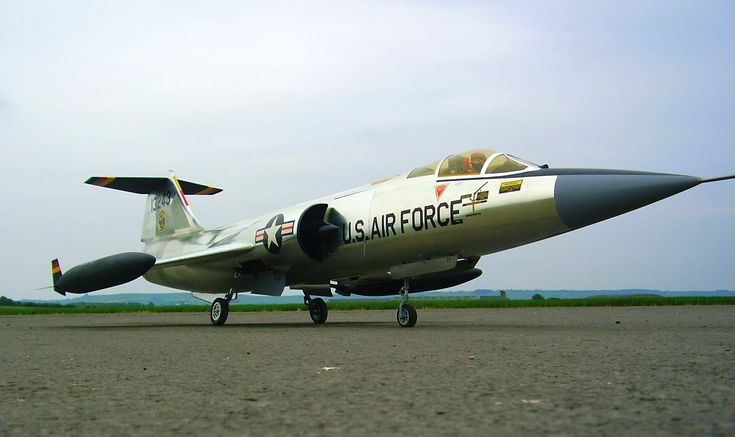 an air force jet sitting on the tarmac