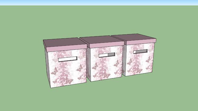 two pink boxes sitting next to each other on a green surface with blue border around them