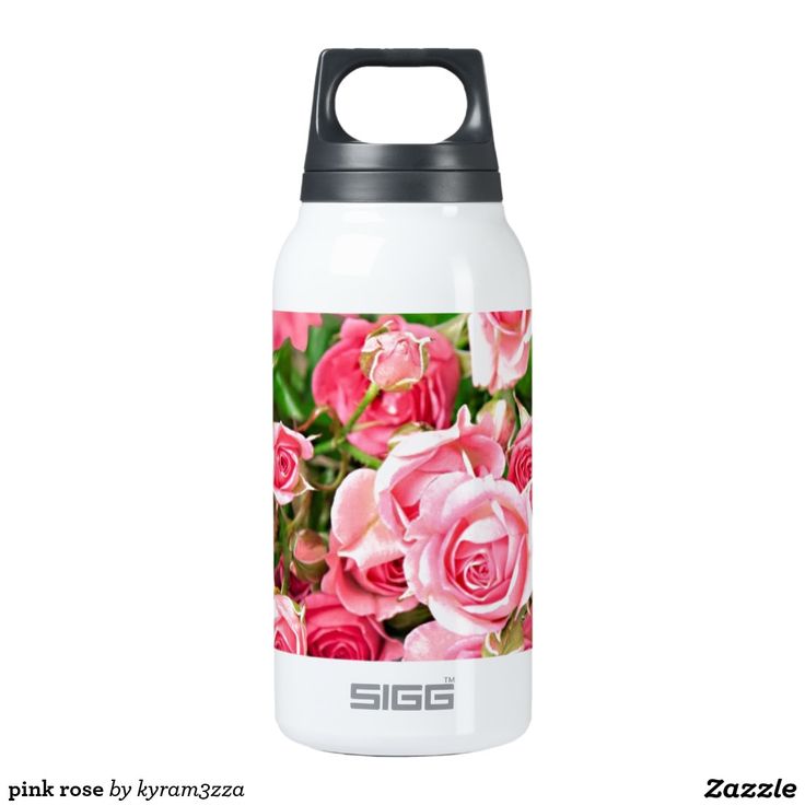 a white water bottle with pink roses on it