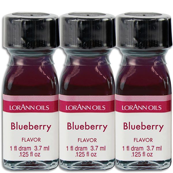 three bottles of blueberry flavor sitting next to each other