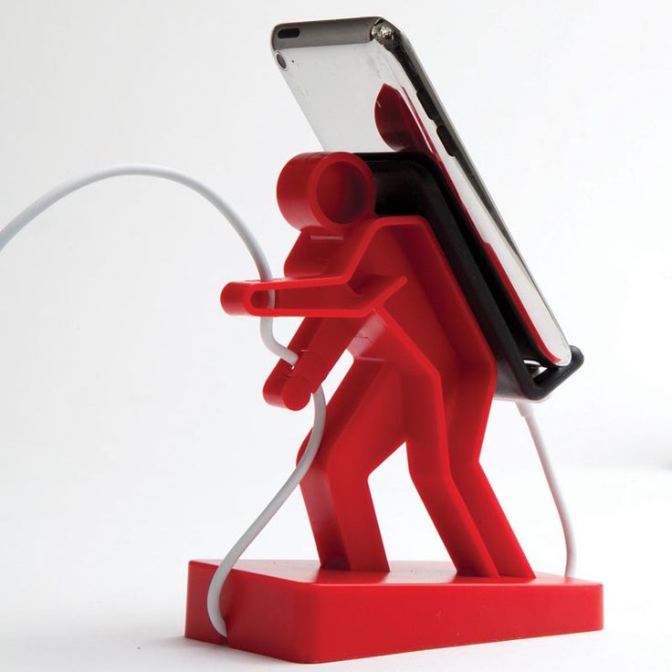 a red figure holding a cell phone and charging it