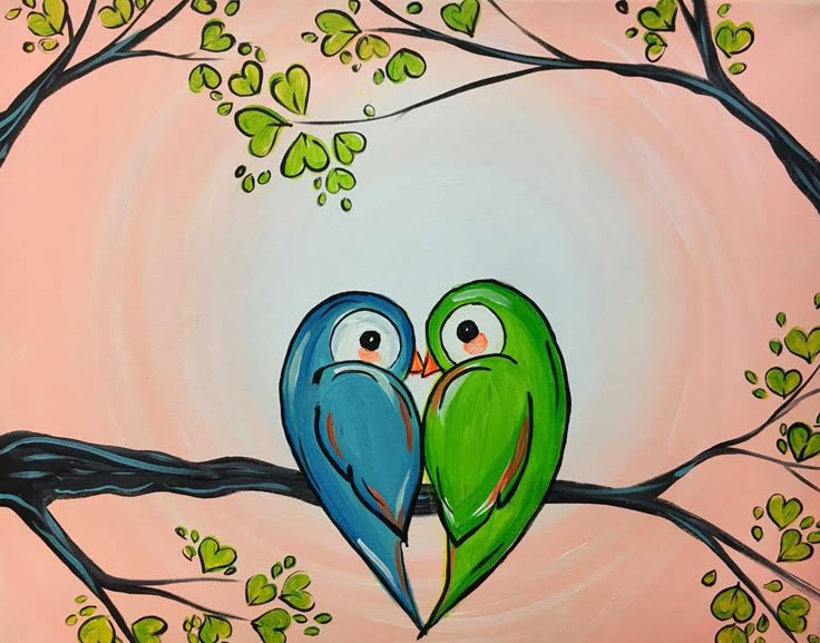 two green birds sitting on top of a tree branch in front of a pink sky