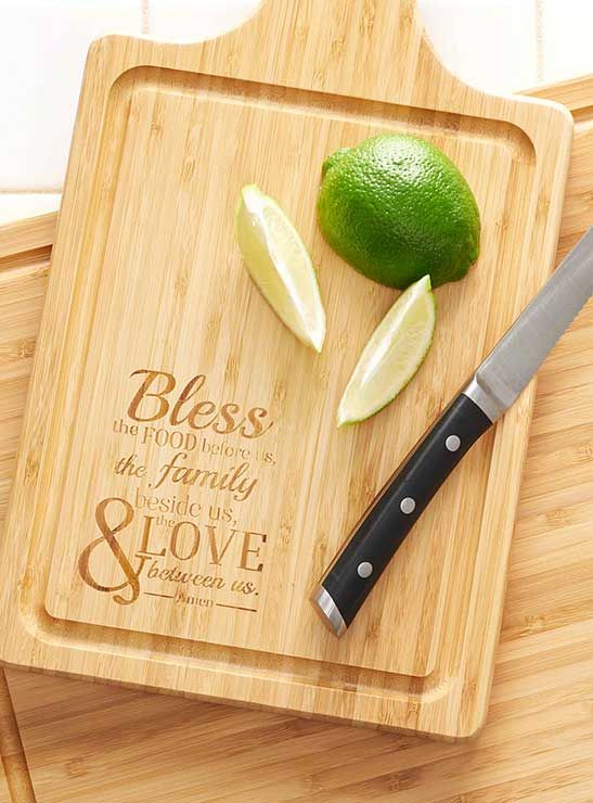 a cutting board with two limes and a knife on it that says, blessing