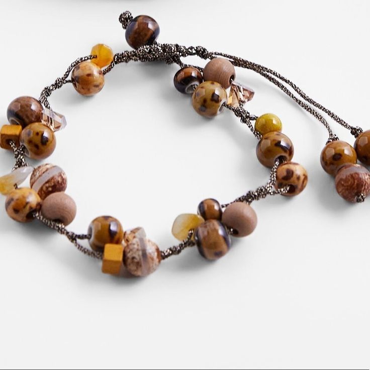 Nwt. Zara Two Brown Beaded Bracelets. #10 Earthy Adjustable Beads For Beach, Earthy Adjustable Beach Beads, Casual Brown Bracelet Jewelry, Beige Bohemian Beaded Bracelets, Adjustable Amber Beaded Necklaces, Casual Brown Beaded Necklaces With Colorful Beads, Earthy Beaded Bracelets For Beach, Casual Adjustable Wooden Beads, Beaded Brown Friendship Bracelets For Beach