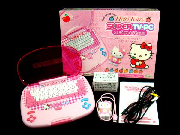 the hello kitty laptop is in its box and it's ready to be used