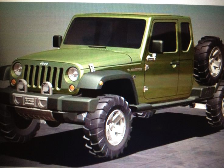 a green jeep is parked in front of a gray wall and grey concrete flooring