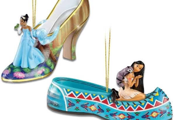 disney princess and prince figurines hanging from shoes with chains on the bottom one is wearing high heels