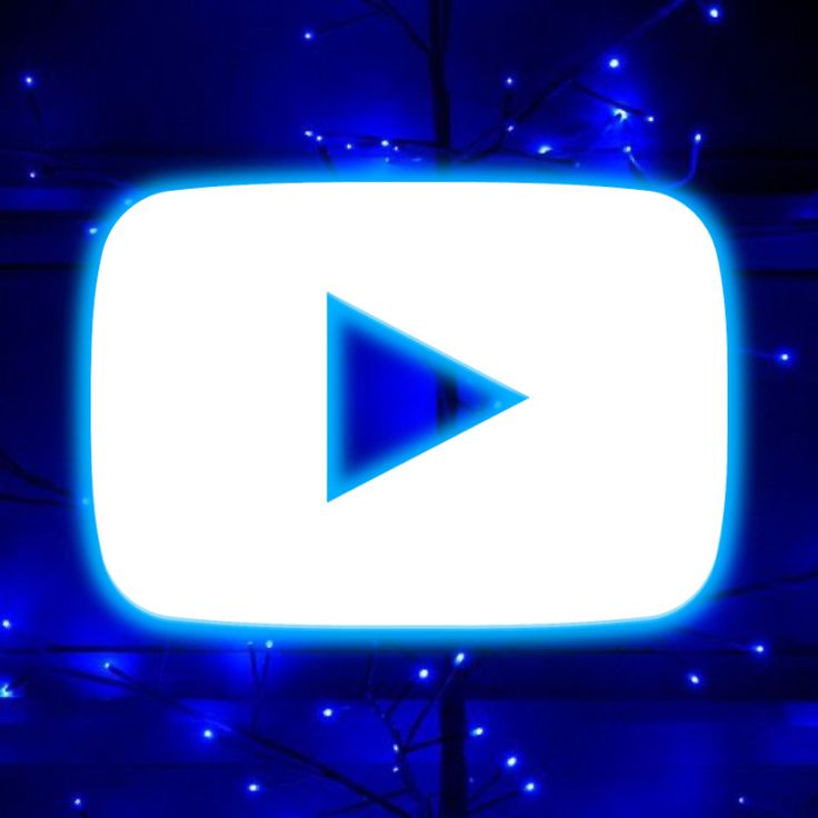 a blue and white sign with the word youtube on it in front of some lights