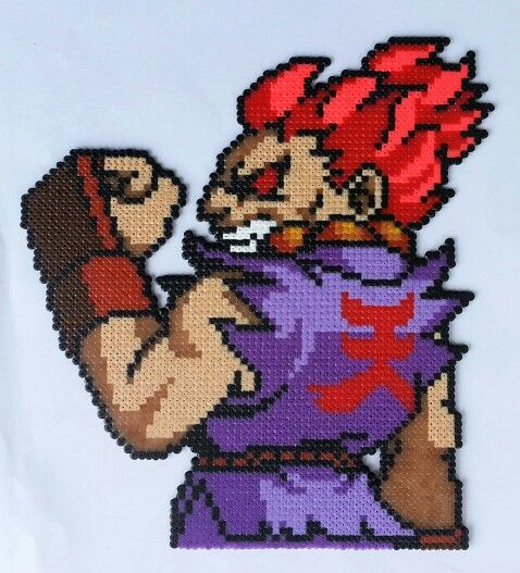 a cross stitch image of a cartoon character with red hair and an evil look on his face