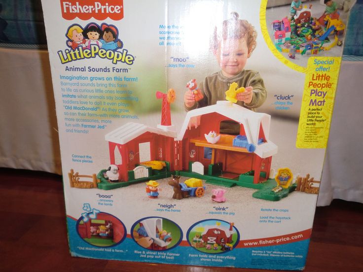 the box is open to show it's contents and features a little people farm